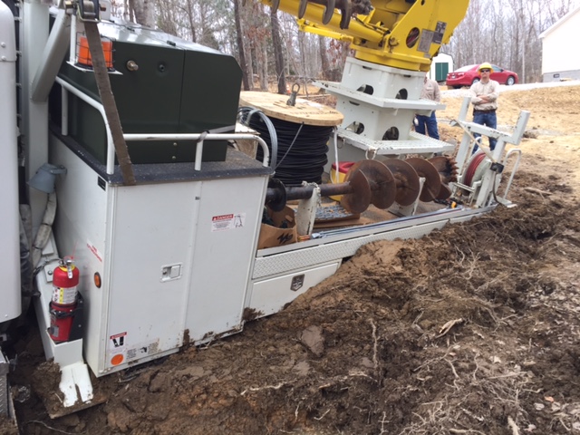 car stuck transporting a manufactured house